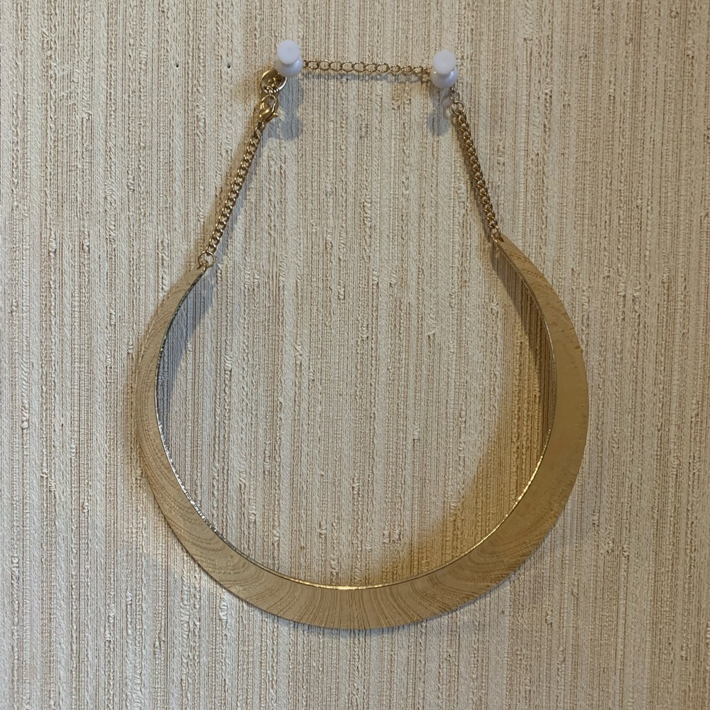 beautiful, golden, cuff shape necklace. 🔱